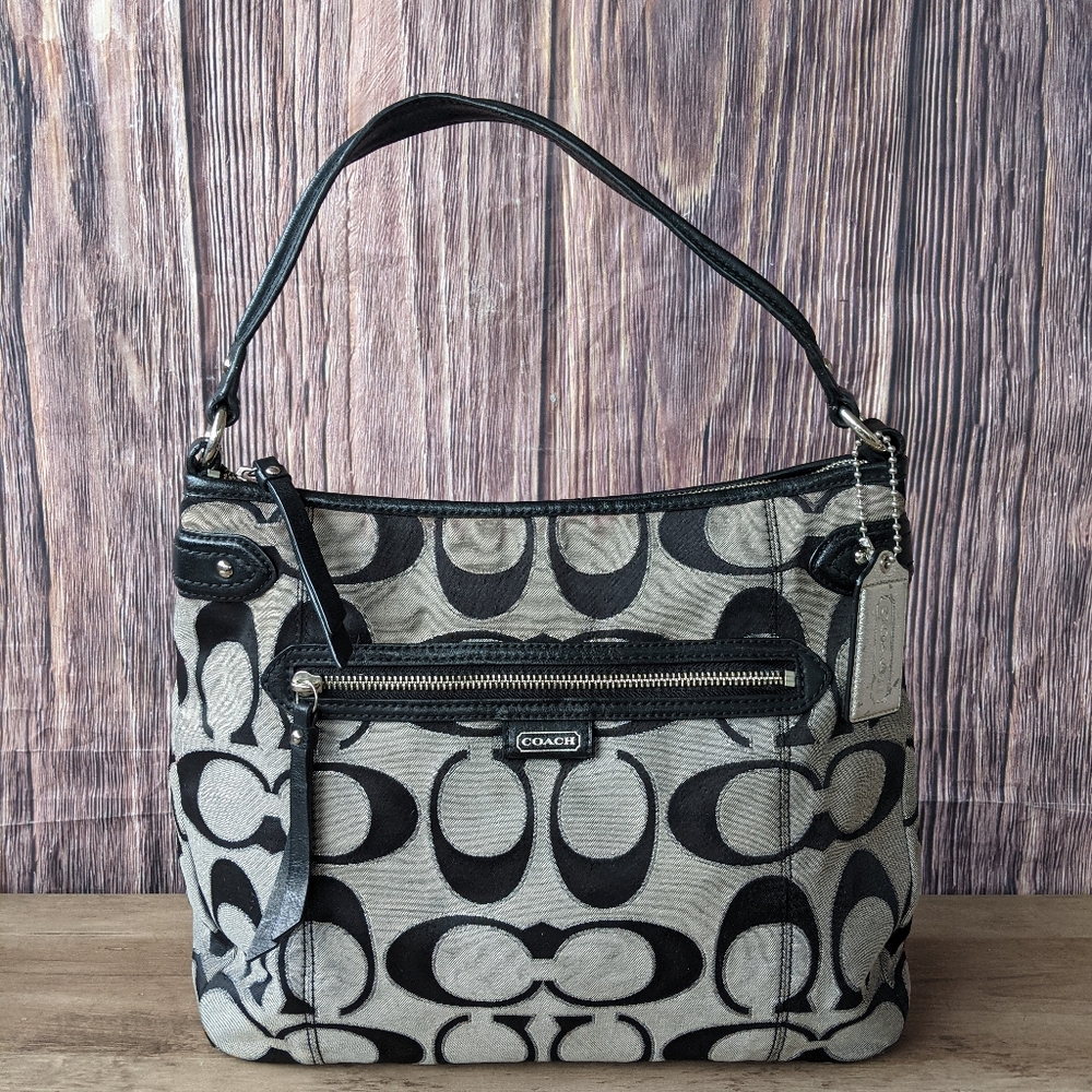 Coach Daisy Signature Hobo bag. This vintage piece is crafted